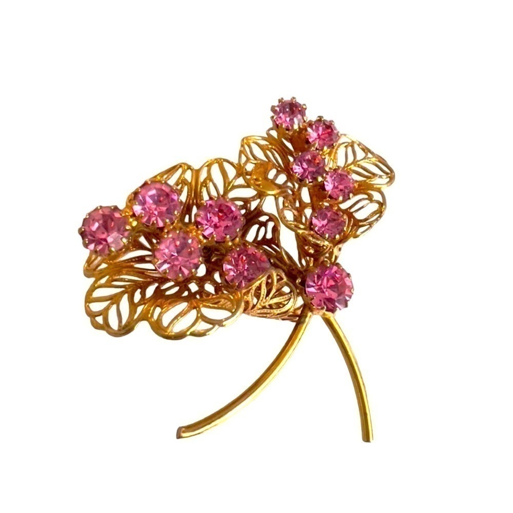 Sparkle and Shine with our Gold Tone Flower Brooch!